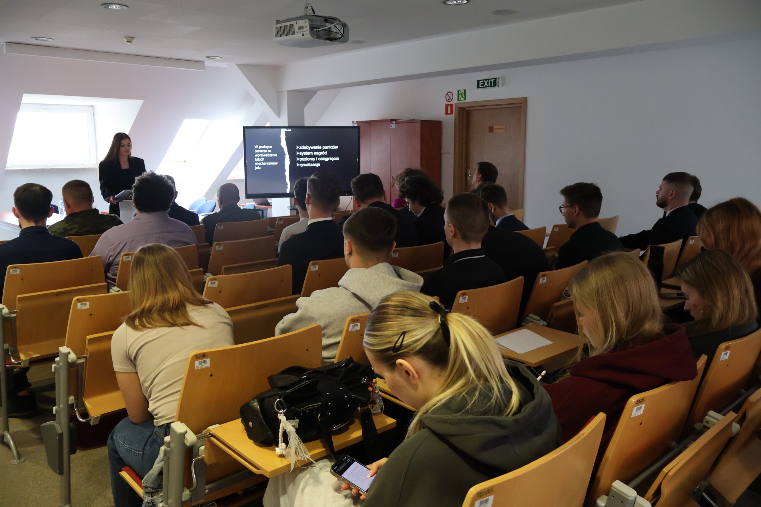 Uczestnicy podczas konferencji naukowej.